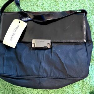 MarinaRinaldi bag made from fabric and Leather detailsails